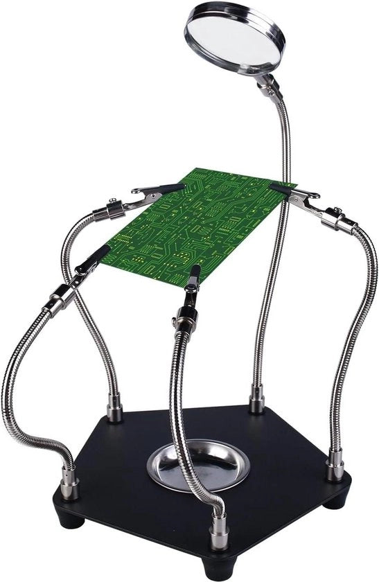 Aiuto per saldatura manuale con lente e illuminazione - posizionamento per più scopi.