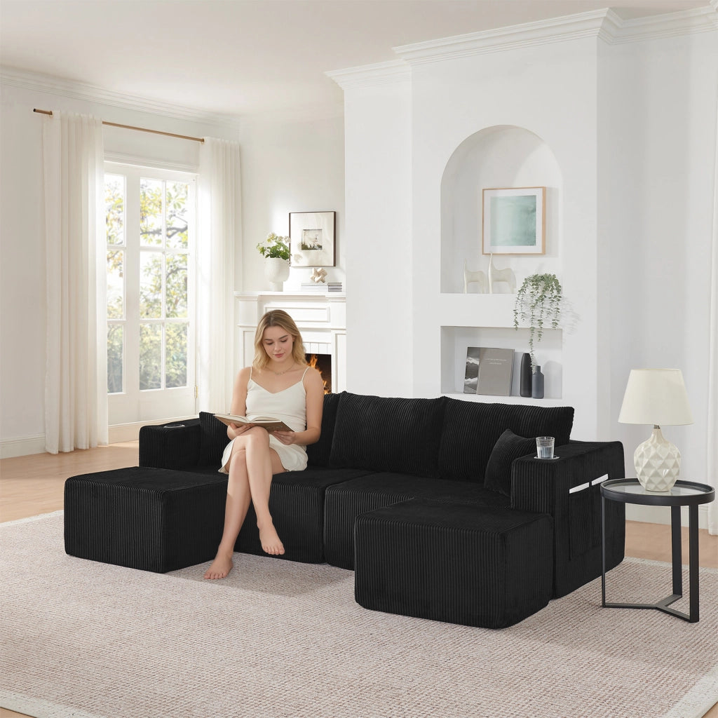 Divano ad angolo a 3 posti, design modulare, rivestimento in velluto a coste, con portabicchieri e cuscini, nero