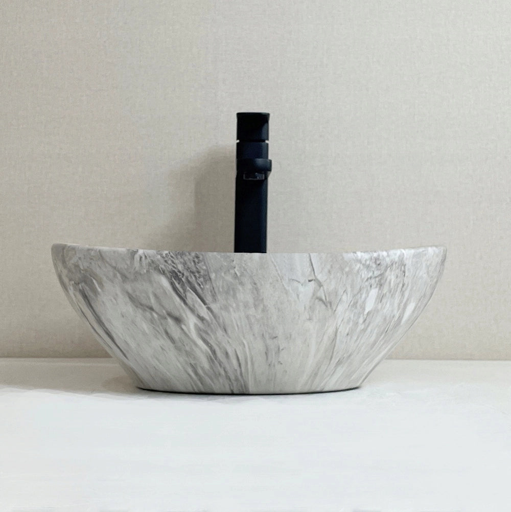 Lavabo da appoggio in ceramica da posizionare su piano in pietra grigia marmo rotondo
