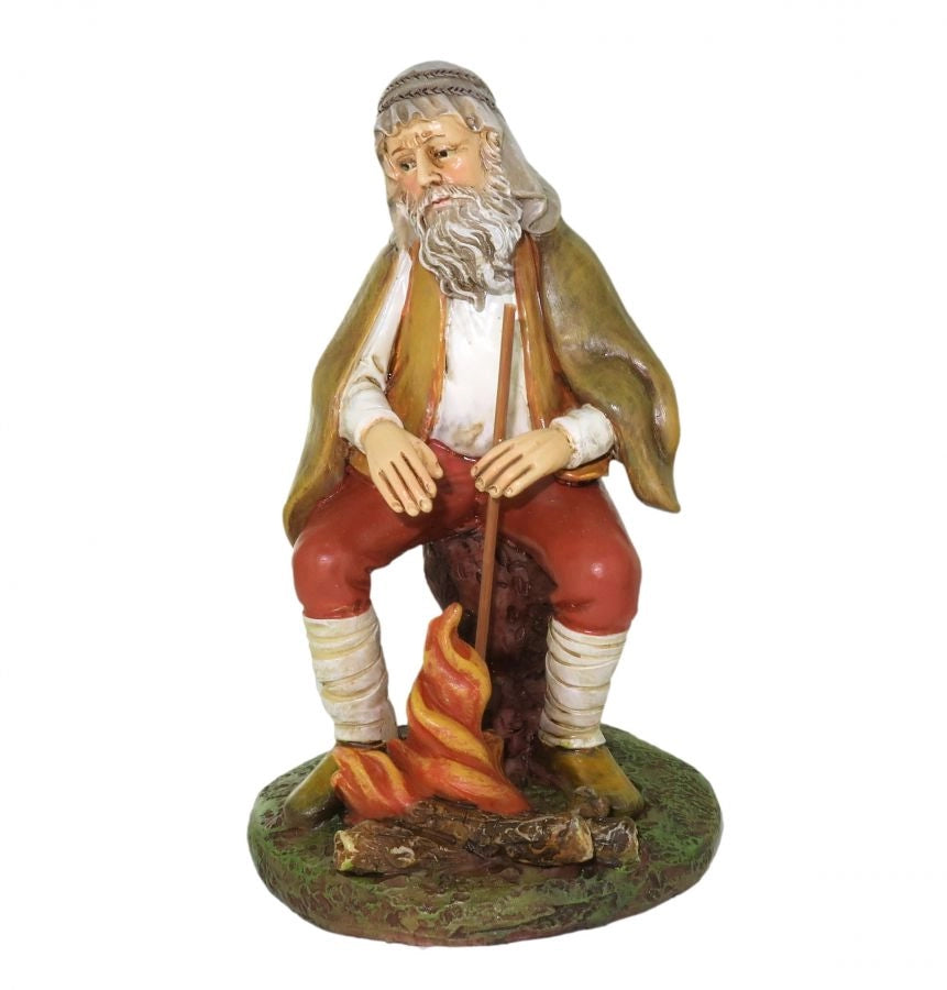 Pastore con fuoco per presepe da 12 cm